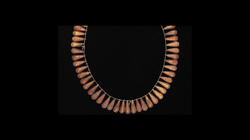 Archaeologists also found this necklace with hollow gold beads resembling flower petals.