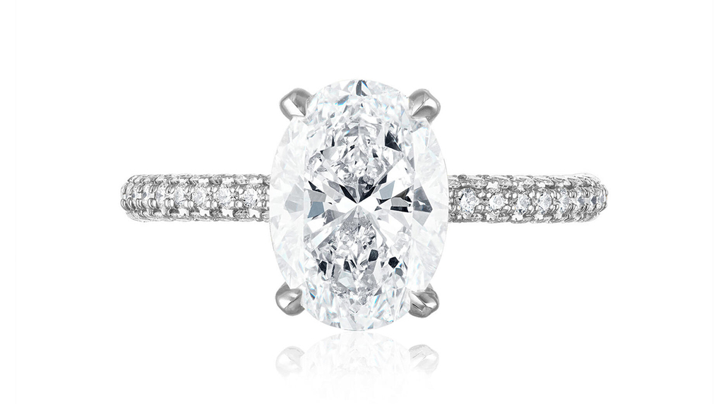 This Stephanie Gottlieb ring, similar to Simone Biles’ engagement ring, features a 2.5-carat G-color SI1 oval-shaped diamond set in the company’s signature platinum three-sided diamond pavé setting.