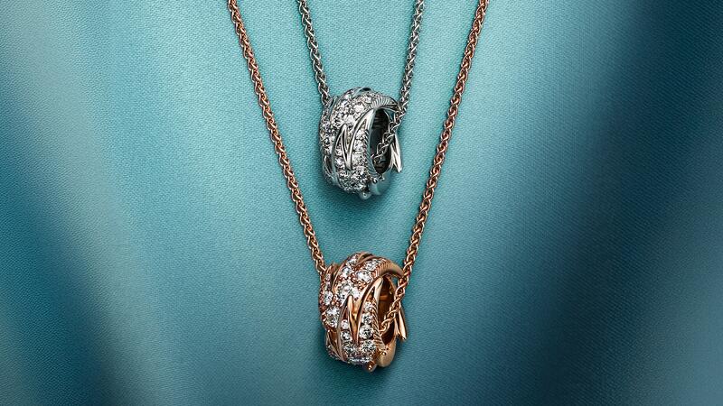 The “Bird on a Rock by Tiffany Wings” rolo pendants in platinum ($7,300), top, and 18-karat rose gold ($7,000), bottom, with diamonds. (Image courtesy of Tiffany & Co.) Tiffany & Co. Bird on a Rock by Tiffany Wings Rolo Pendants