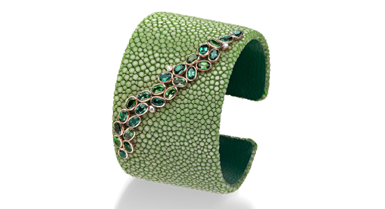 Category: Bracelets up to $5,000. Designed by Hans Schullin of Schullin in Graz, Austria. Entry information: Green galuchat cuff with a branch of green oval cut tourmalines (5.36 total carats) and white brilliant-cut diamonds (0.05 total carats) in 18-karat fair trade rose gold ($2,900)