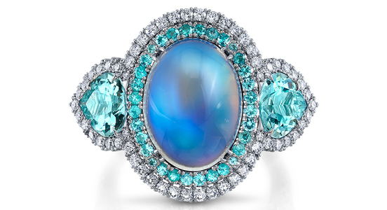 Category: Engagement Rings $5,001 and Up. Designed by Niveet Nagpal of Omi Privé in West Covina, California. Entry information: Platinum ring featuring an 8.86-carat oval blue moonstone accented by pear-shape Paraíba-type tourmalines (1.10 total carats), round Paraíba tourmalines (0.34 total carats) and round diamonds (0.96 total carats) ($34,000)