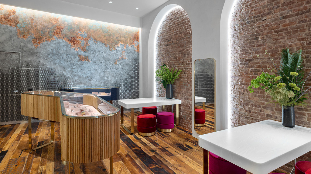 In designing their new store, the Gandia sisters wanted it to look elegant but not intimidating—see: the playful chandelier at the store’s entrance—and to be an homage to New York City by incorporating elements such as exposed brick. (Photo credit: Tom Sibley)