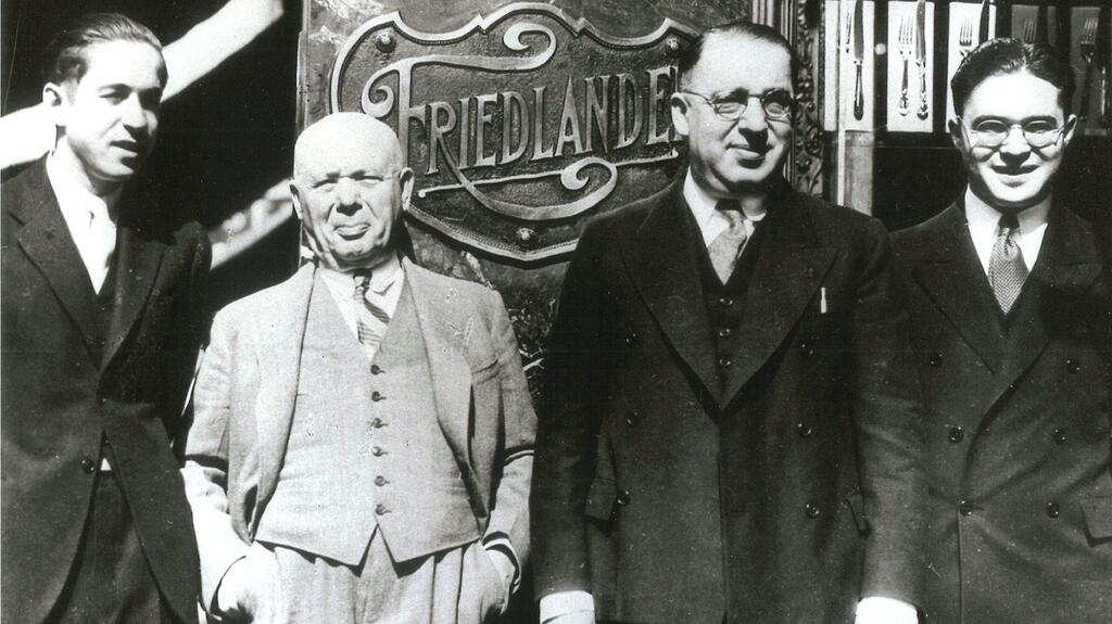 Members of the Friedlander family outside their Seattle jewelry store (Photo courtesy of Alvin Goldfarb Jeweler) Friedlander family members
