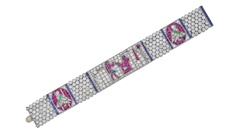 This Lacloche Frères Egyptian Revival bracelet set with diamonds, rubies, sapphires, and emerald sold near the top end of its pre-sale estimated range of $1 million to $1.5 million, with a buyer paying $1.2 million for the piece.