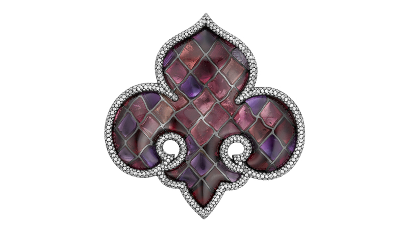 The “Vitrail Fleur-de-Lys” brooch features amethysts, tourmalines, garnets, and round diamonds in 18-karat gold and silver. Created in 1987, it is expected to earn between $80,000 and $120,000. (Image courtesy of Christie’s Images Ltd. 2022)