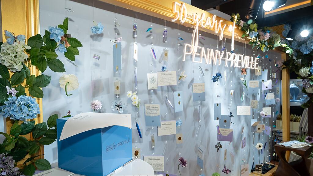 A “Love Letters” campaign image that was on display in the Penny Preville booth at JCK Luxury in Las Vegas Penny Preville Booth Love Letters Display JCK Luxury Las Vegas 2025