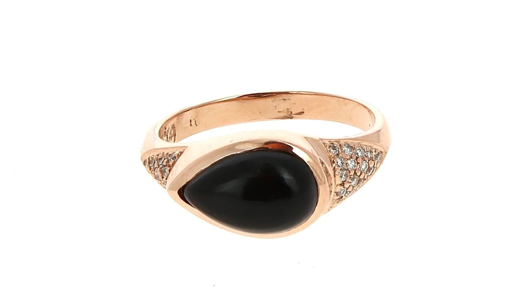 A Jacquie Aiche onyx and diamond ring in 14-karat gold, available at Mad Lords ($4,330)