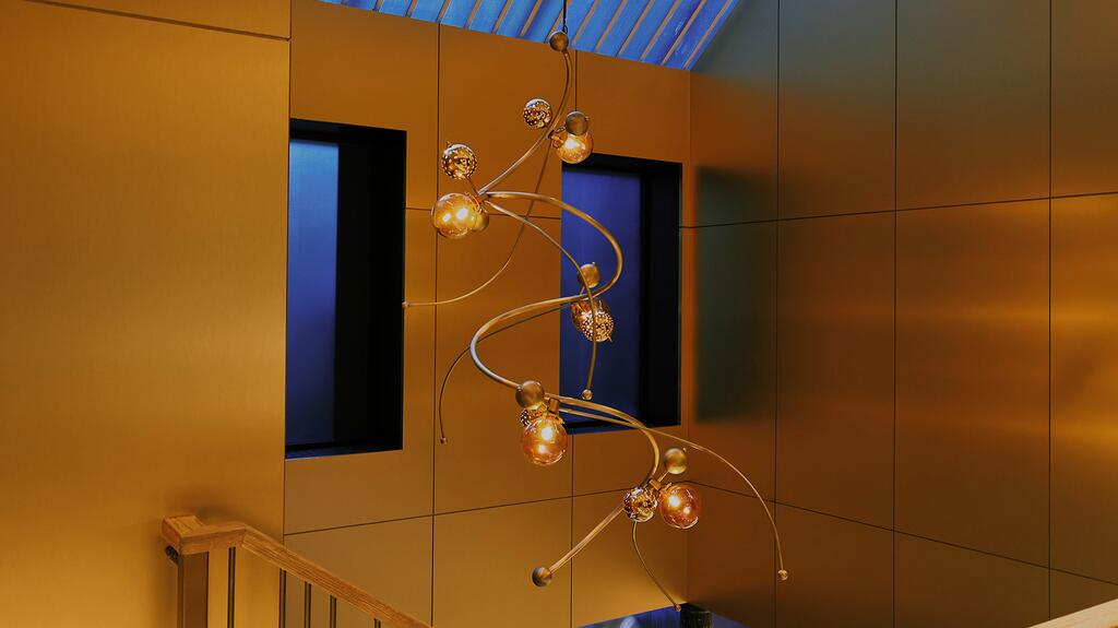 A chandelier with 1,500 carats of fancy-colored and white lab-grown diamonds designed by FIT student Sienna D’Andrea, who won the Facets of Light contest. It is estimated at $1.2 million. Grown Brilliance NYC Flagship Facets of Light Diamond Chandelier