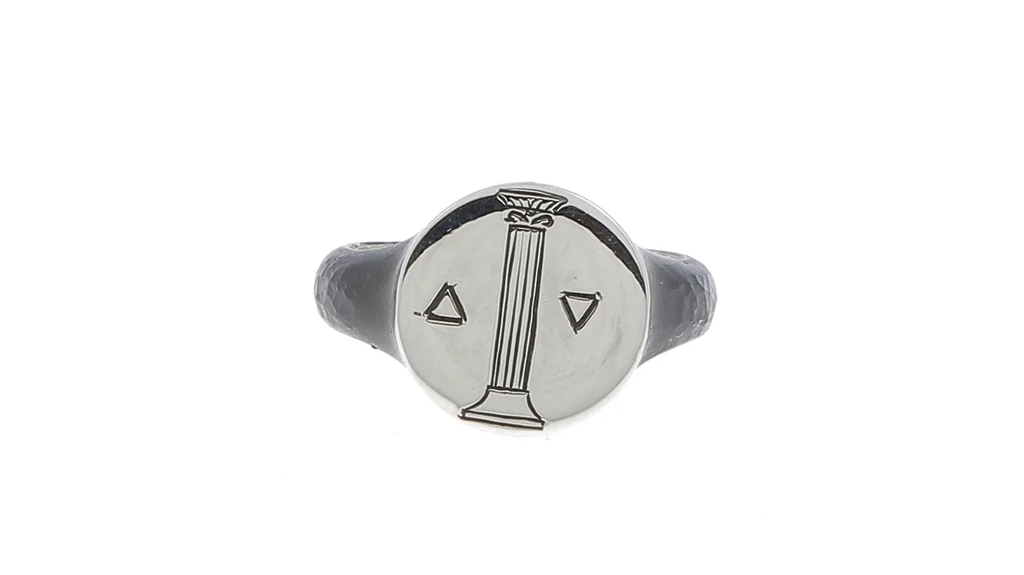 A silver signet ring by brand Henson ($280). Serge and Caroline Muller advise clients to incorporate moodier tones like silver into their fall jewelry wardrobes.