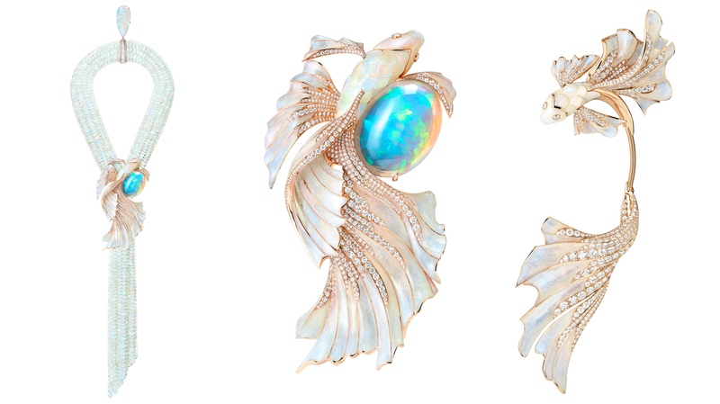 The “Opalescence” set comprises a necklace (left) that converts into a brooch (center) and an earring (right). The “Opalescence” necklace is set with a 71.69-carat white Ethiopian opal cabochon and a 46.91-carat white Ethiopian opal pear-shaped cabochon in pink gold with enamel and diamonds. Including the opal beads, the entire opal carat weight is 1,518.78 carats.