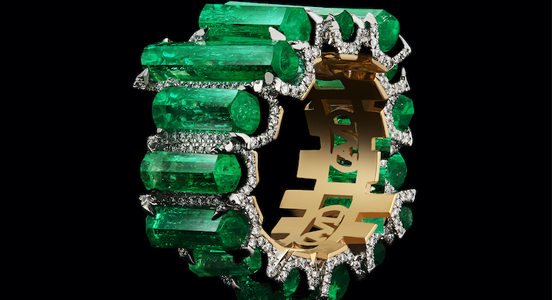 Category: Rings $5,001 and Up. Designed by Alexandra Mor of Alexandra Mor in New York City. Entry information: Eternity band set with 15.27 carats of one-of-a-kind hexagon-cut Muzo Columbian emeralds and diamonds wide-set in platinum on an 18-karat yellow gold Alexandra Mor logo gallery ($55,000)