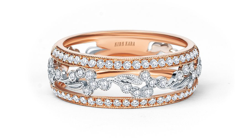 This 14-karat gold two-tone wedding band is from Kirk Kara’s new “Rayana collection.” It features approximately 0.38 carats of diamonds and milgrain edging ($4,340).