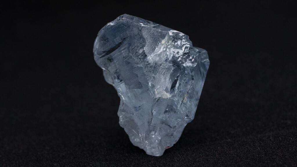 41.82-carat rough blue diamond recovered from the Cullinan Mine on black background