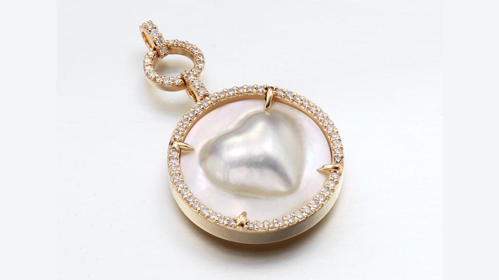 Lex Fine Jewelry “Diana’s Love” pendant in 14-karat yellow gold with a Mabe blister pearl and 1 carat of diamonds
