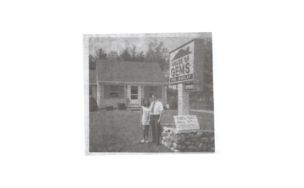 Jim and Ann Marie Dunn in front of their original jewelry store, the House of Gems in Hanover, Massachusetts. Son Sean Dunn said when his parents first opened the store they didn’t have a light for the sign so they used Jim’s car headlights to illuminate it at night.