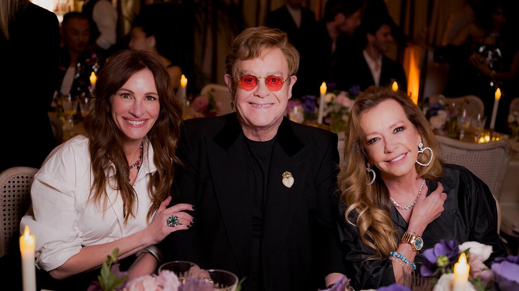 Julia Roberts, Elton John and Caroline Scheufele