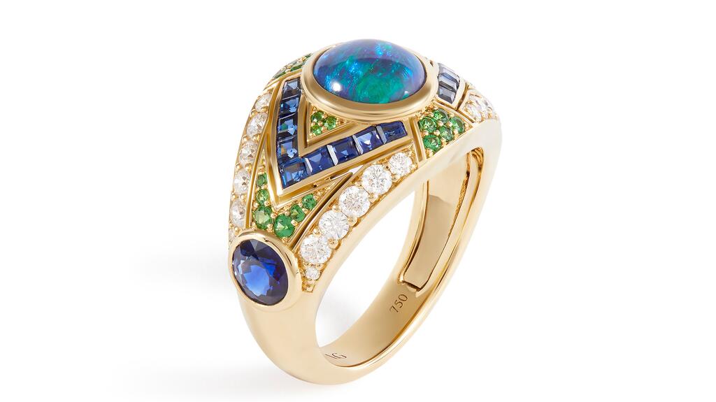 From Laura Gallon Joaillerie’s “Dynasty” collection is the “Gaia” ring in 18-karat yellow gold with black opal from Lighting Ridge, Australia, with blue sapphires, tsavorites, and diamonds ($21,200) Laura Gallon Joaillerie Gaia Ring