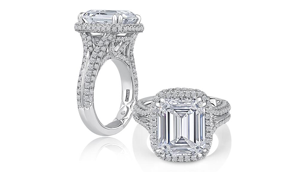 A. Jaffe engagement ring in 18-karat white gold with 5-carat emerald-cut diamond center stone and 1.69 total diamond carats in the setting