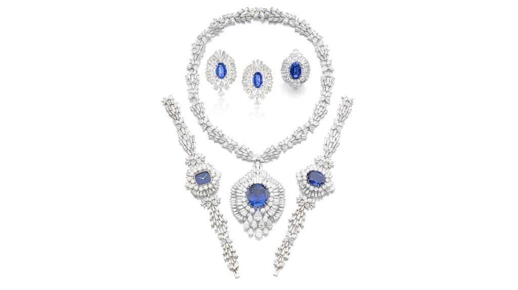 This sapphire and diamond parure includes a pendant necklace, a bracelet, a pair of earrings, a ring, and a watch. Sapphire and diamond parure