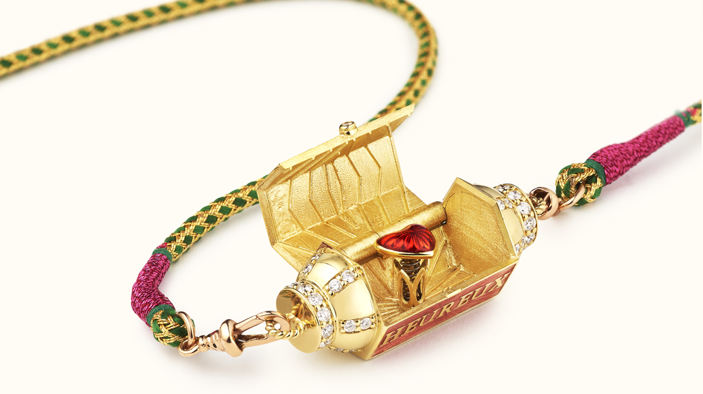 Inside this Marie Lichtenberg locket is a sweet enamel heart.