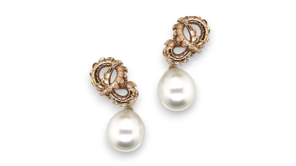 Ohliguer’s “Lovers Croc Tail” earrings in 18-karat rose gold with detachable Australian South Sea pearl drops ($8,200) Ohliguer Lovers Croc Tail Earrings