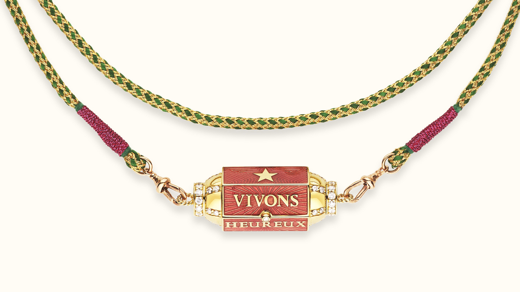 Another view of the “Vivons Heureux Vivons Caches” locket