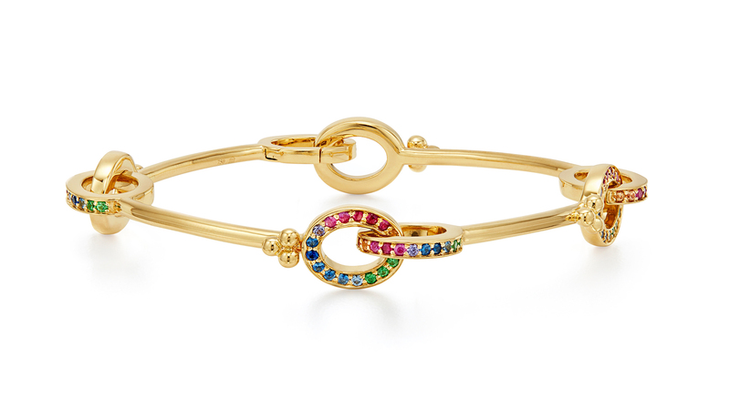 <a href="https://templestclair.com/products/18k-orsina-link-bracelet-with-mixed-sapphire?_pos=4&_sid=22d9ddd7c&_ss=r" target="_blank">Temple St. Clair</a> rainbow sapphire “Orsina” bracelet in 18-karat gold ($7,900)