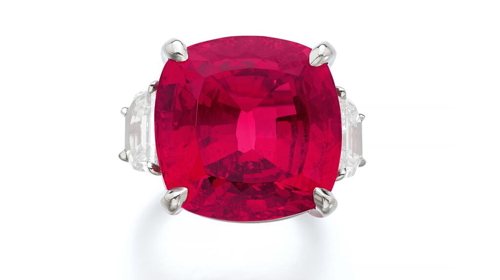This ring is set with a 35.25-carat cushion-shaped spinel. Spinel and diamond ring