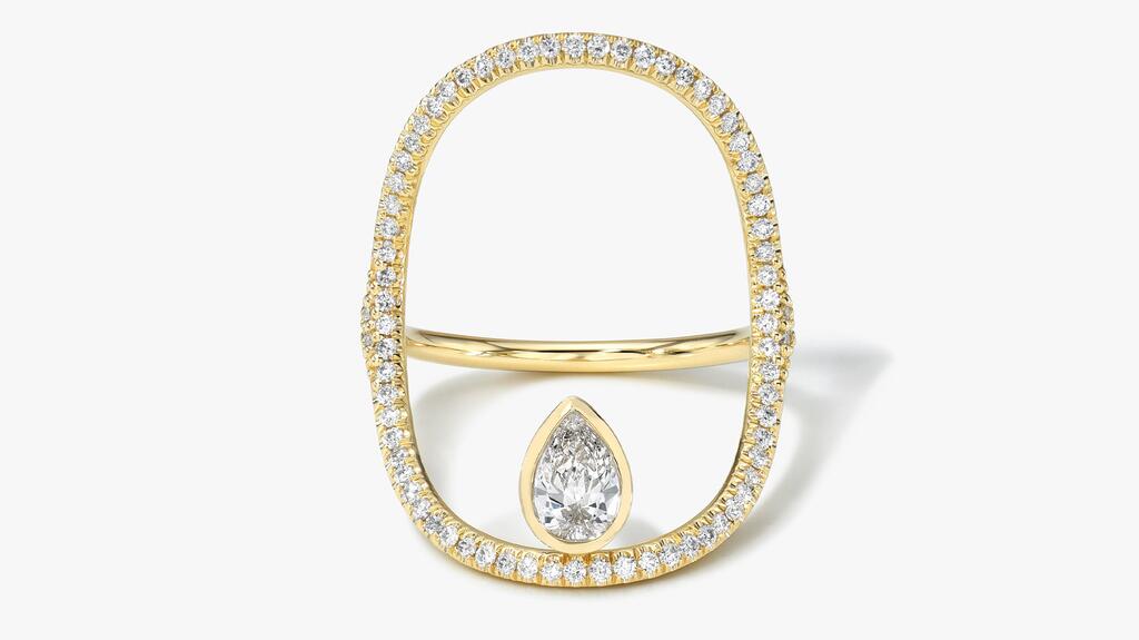 The “Continuity” ring by White Space with a 0.33-carat pear-cut diamond and diamond pavé set in 14-karat yellow gold ($5,370) White Space Continuity Pave Pear Ring