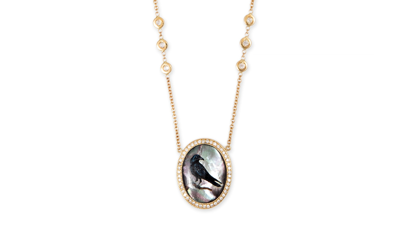 <a href="https://jacquieaiche.com/products/hand-painted-raven-on-black-mother-of-pearl-necklace" target="_blank">Jacquie Aiche</a> hand painted raven on black mother-of-pearl necklace in 14-karat gold ($7,750)