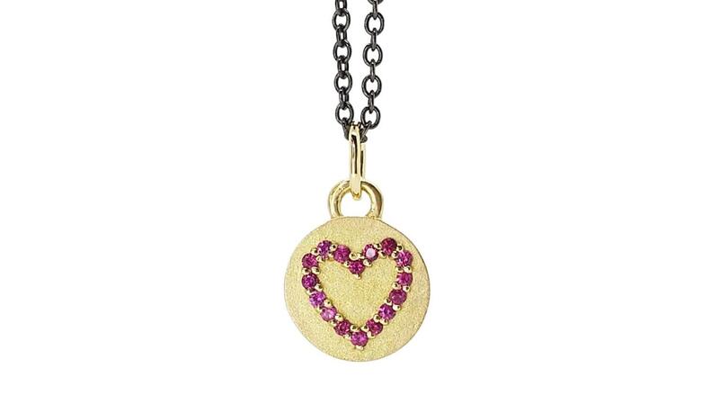 Alison Nagasue “Magic Heart Disc Necklace” with rubies in 18-karat gold on a blackened silver chain