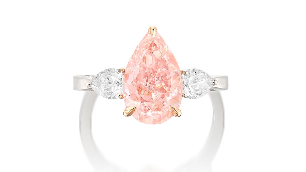 fancy intense orangy pink diamond and diamond ring
