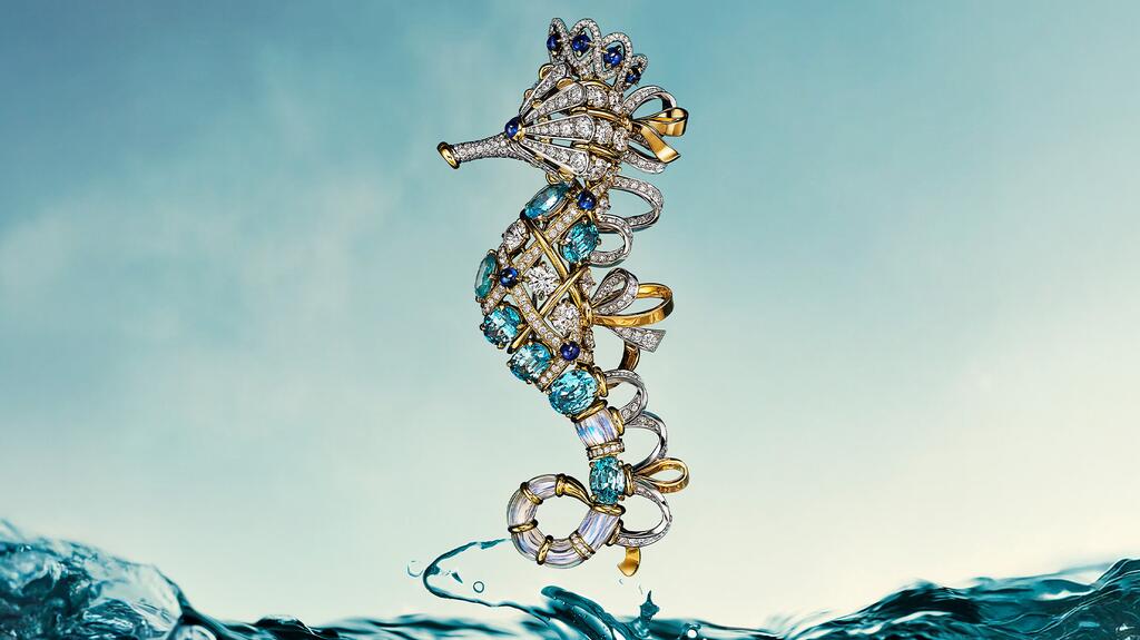 The “Seahorse” brooch, which also can be worn as a pendant, features more than 12 carats of blue zircons, sapphires, moonstones, and diamonds set in 18-karat yellow gold and platinum. (Image courtesy of Tiffany & Co.) Tiffany & Co. Seahorse Brooch Pendant