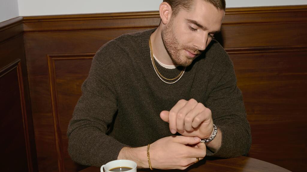 Man wearing Zales jewelry