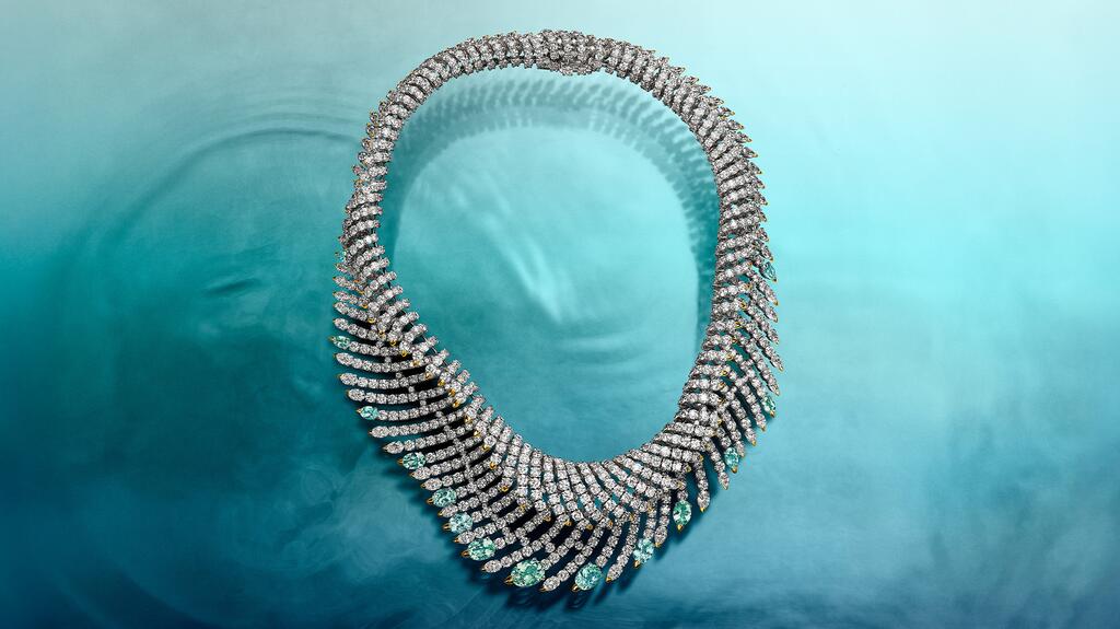 The “Wave” necklace in 18-karat white and yellow gold with diamonds, green cuprian elbaite tourmalines totaling more than 10 carats, and blue cuprian elbaite tourmalines totaling more than 6 carats (Image courtesy of Tiffany & Co.) Tiffany & Co. Wave Necklace