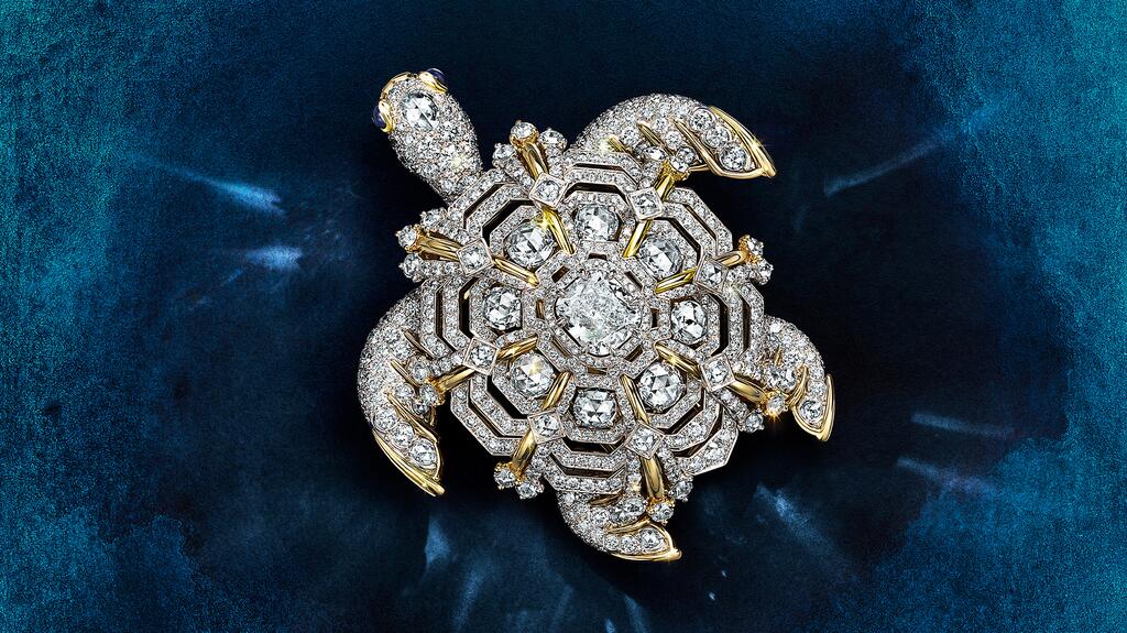 The “Sea Turtle” pendant has a more than 4-carat diamond at the center of its shell. It is crafted in platinum with 18-karat yellow gold accents. Sapphires are seen as well, representing the reptile’s eyes. (Image courtesy of Tiffany & Co.) Tiffany & Co. Sea Turtle Pendant