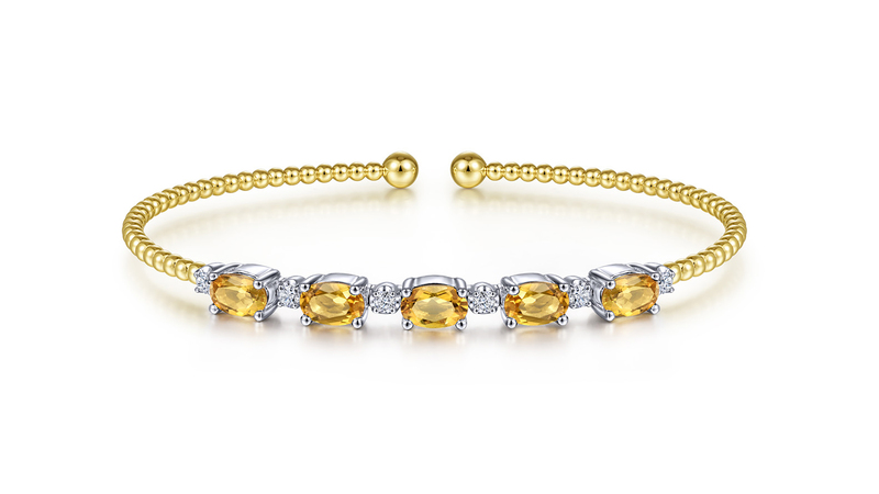 <a href="https://www.gabrielny.com/14k-white-yellow-gold-bujukan-bead-cuff-bracelet-with-citrine-and-diamond-stations-bg4448-62m45ct" target="_blank">Gabriel & Co.</a>14-karat white and yellow gold “Bujukan” cuff bracelet with citrine and diamond stations ($1,925)