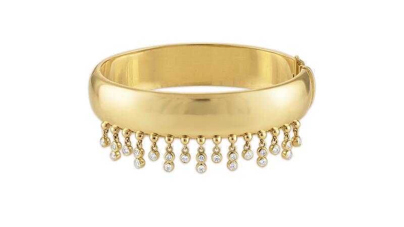 <a href="https://www.jaderuzzo.com/shop-jewelry/p/tennessee-drip-bangle" target="_blank">Jade Ruzzo </a> “Tennessee Drip” bangle in 18-karat yellow gold with diamonds (price upon request)