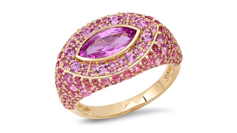 A ring centering on a 0.60-carat marquise-cut pink sapphire surrounded by pink sapphire pavé in 14-karat yellow gold ($8,295) Eriness Pink Sapphire Marquise Ring