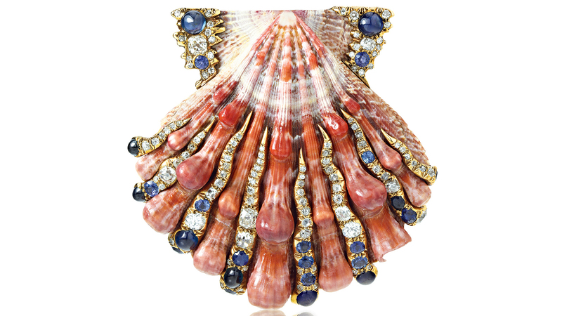 This Verdura Lion’s Paw Shell Brooch features a natural scallop shell set with sapphires and diamonds in gold, and is one of two in the exhibition. Duke Fulco di Verdura made the brooches using shells he purchased in the museum gift shop in 1940. (Courtesy of Stephen Webster)