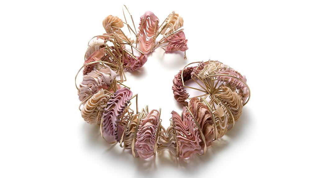 Student Lee Min Seo’s winning “Rhythm Reborn” piece is made from worn-out leather originally used for a janggu, a traditional Korean percussion instrument. Lee Min Sea Rhythm Reborn Jewelry