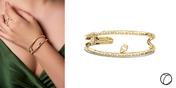 Trellis Cuff: Our 14-Karat yellow gold Trellis Cuff with scattered diamonds and an accent of two pear illusion diamonds hanging ($2,949)