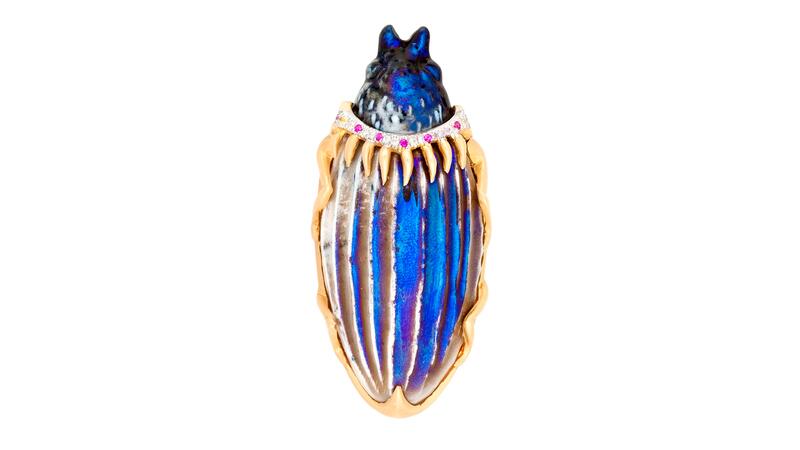 Guita M iridescent porcelain scarab pin with a collar of diamonds and rubies ($2,800) Guita M porcelain scarab pin