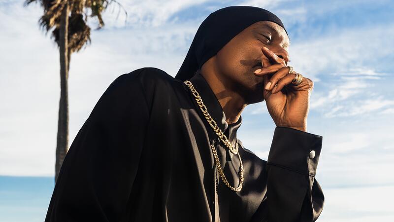 Snoop Dogg wearing Lovechild jewelry