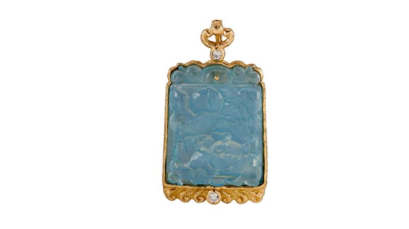 <a href="http://www.katybriscoe.com/" target="_blank">Katy Briscoe</a> 18-karat yellow gold carved aquamarine and diamond pendant ($20,000)