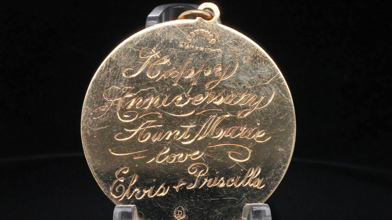Danker & Sons name can be seen at the top of the pendant and its maker’s mark at the bottom. Priscilla is said to have personally had this piece engraved. (Photo courtesy Kruse GWS Auctions)