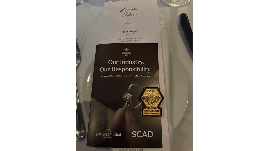 SCAD bee pin with a menu