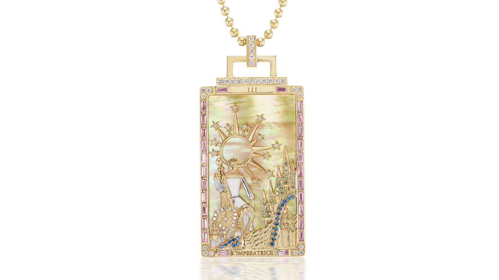 “L’Imperatrice” or “The Empress” tarot card pendant in 18-karat yellow gold with 15.10 carats of yellow mother-of-pearl, 1.65 total carats of color-change garnet, green sapphire, blue sapphire, and diamond ($19,500). Sorellina engraves the name of each tarot card pendant in Italian, a nod to the sisters’ heritage.