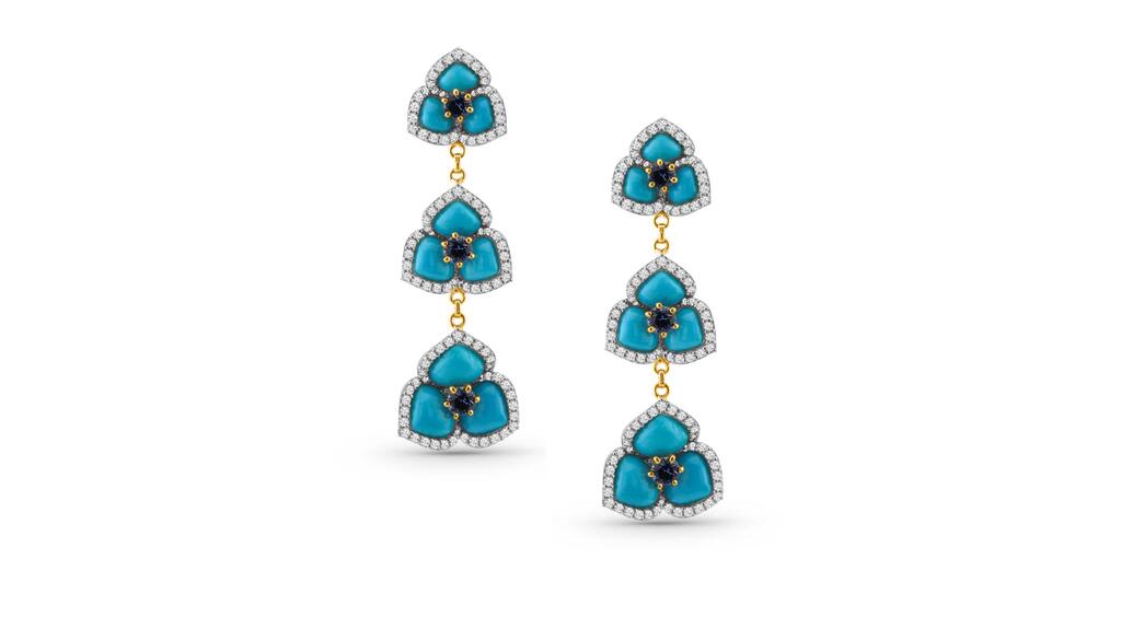 Tresor Collection Inc., designed by Puja Bordia in Coral Gables, Florida. Earrings in 18-karat yellow gold with 9.82 carats of Sleeping Beauty turquoise with diamonds and blue sapphire ($9,000) Tresor Collection sleeping beauty turquoise earrings
