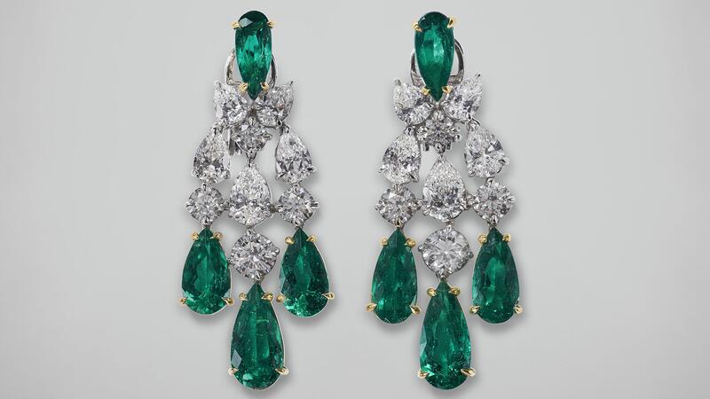 The matching earrings also will be offered at the auction.